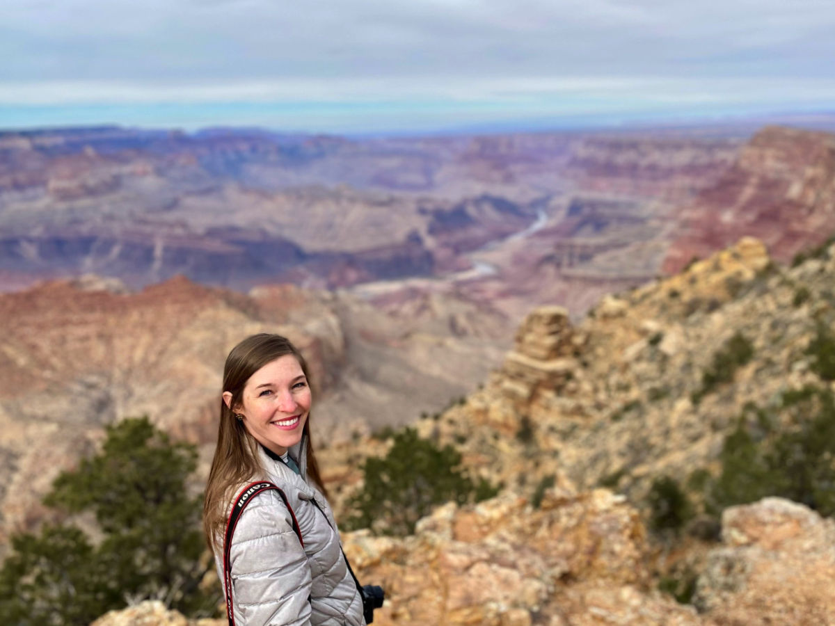 posing in front of the Grand Canyon