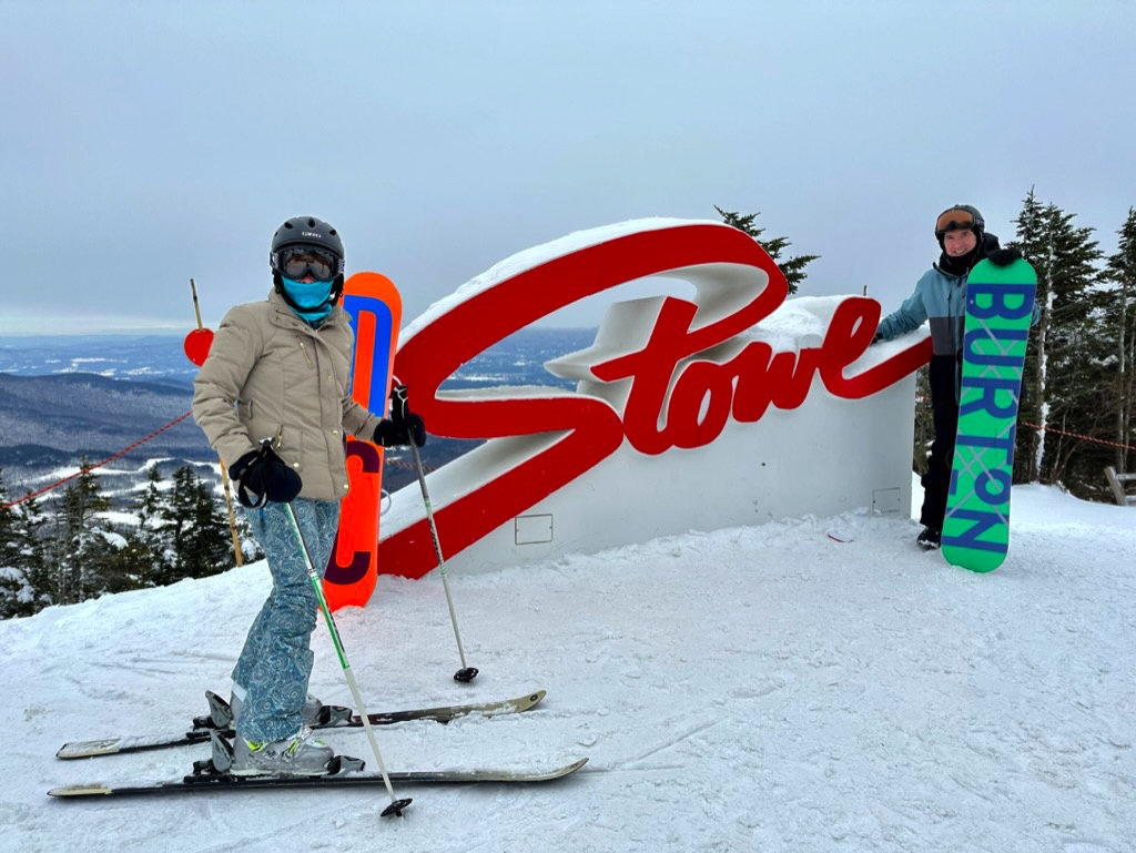 On top of Mt. Mansfield in front of the Stowe sign