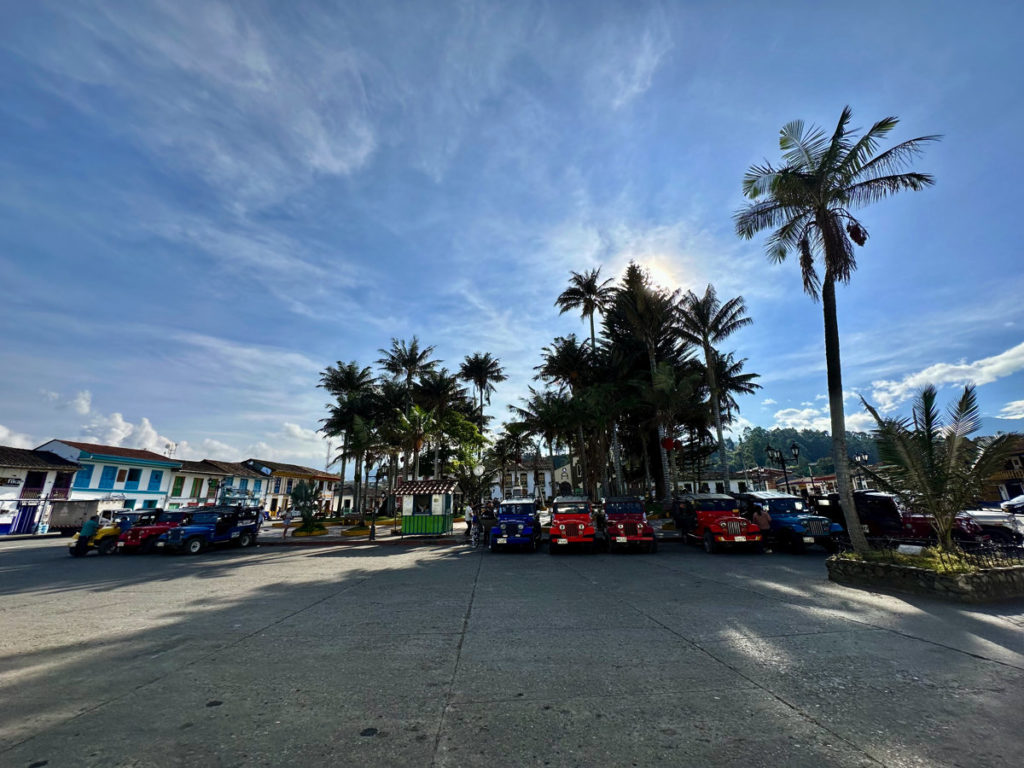 A picture of the Willys (Jeeps) lined up in the Plaza de Bolivar in Salento