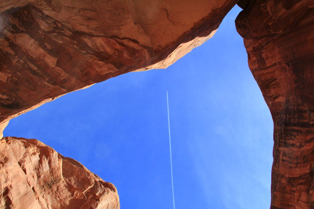 Contrail through Double Arch